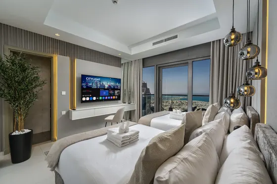 Stunning 2BR w/ Seaview- Infinity Pool & Burj View