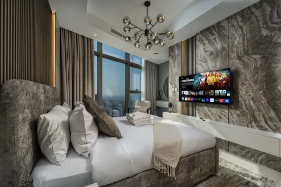 Stunning 2BR w/ Seaview- Infinity Pool & Burj View