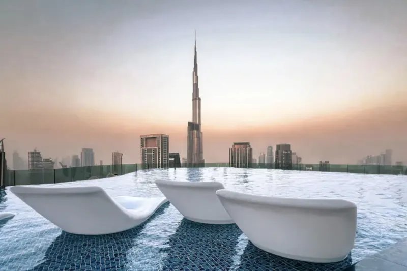 Dive Into Luxury: Infinity Pool w/ Burj View