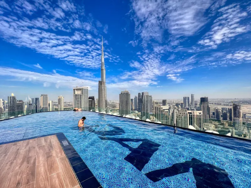 Immerse in Elegance: Infinity Pool w/ Burj View